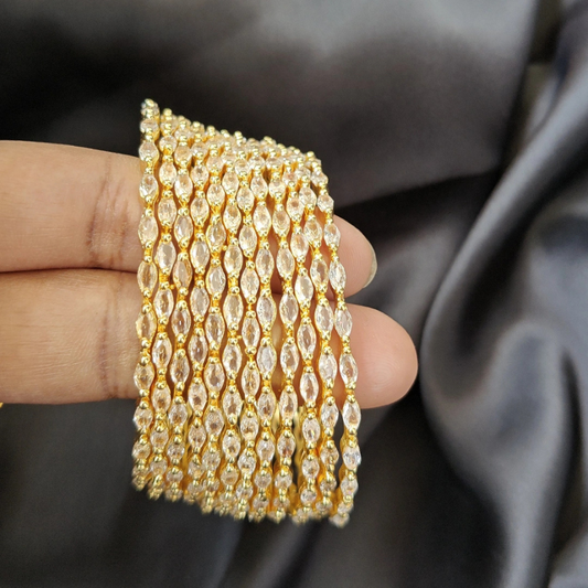 ORIGINAL GOLD POLISH RAINDROP BANGLES