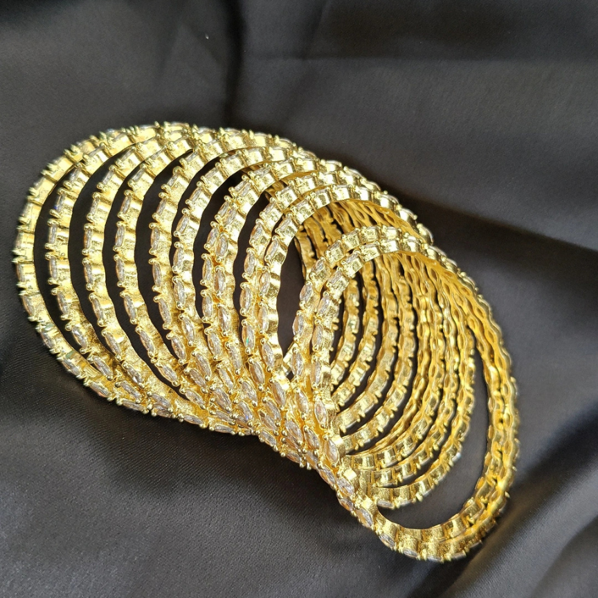 ORIGINAL GOLD POLISH RAINDROP BANGLES