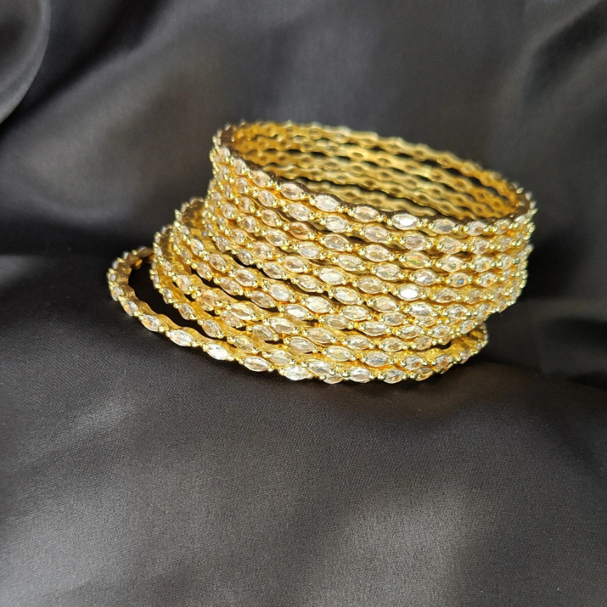 ORIGINAL GOLD POLISH RAINDROP BANGLES