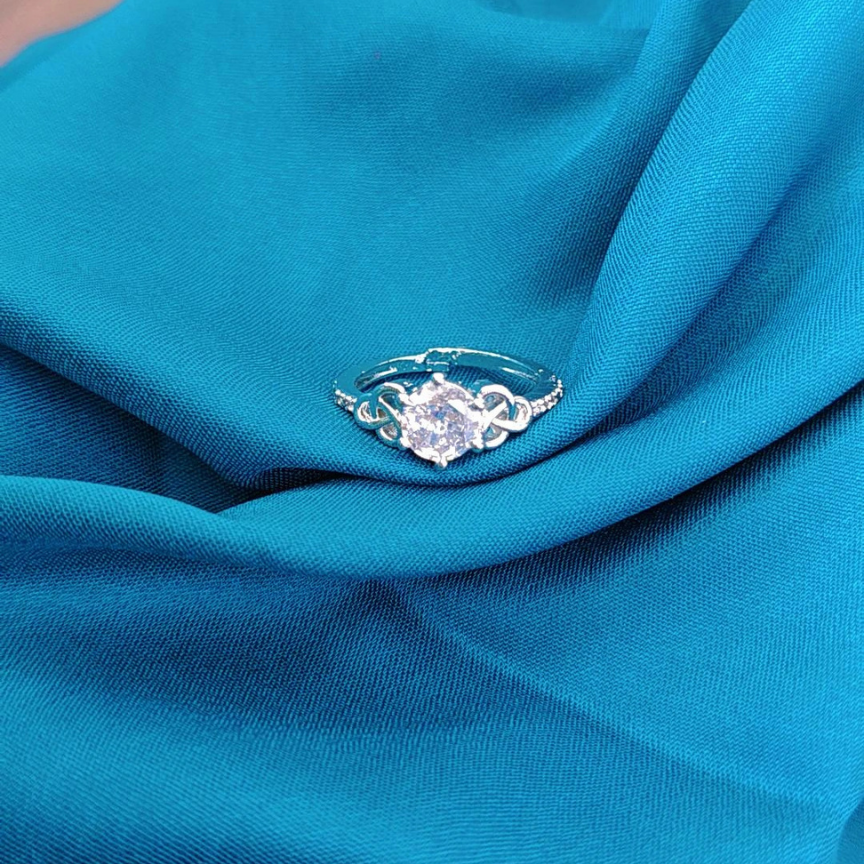 NITA ADJUSTABLE AMERICAN DIAMOND RING