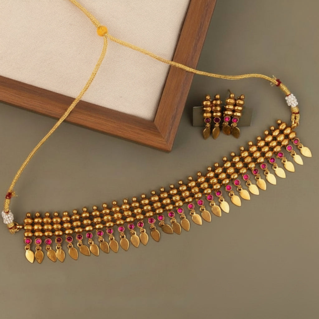 GOLDEN NISHIKA ELAKKATHALI JEWELLERY SET